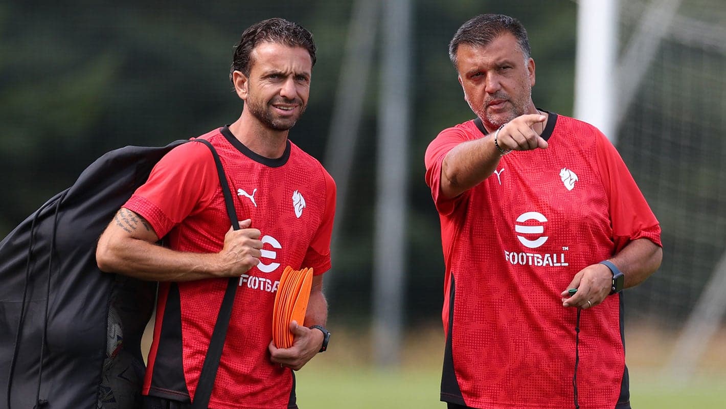 Milan Primavera coach Giovanni Renna (right) during a training session at the PUMA House of Football