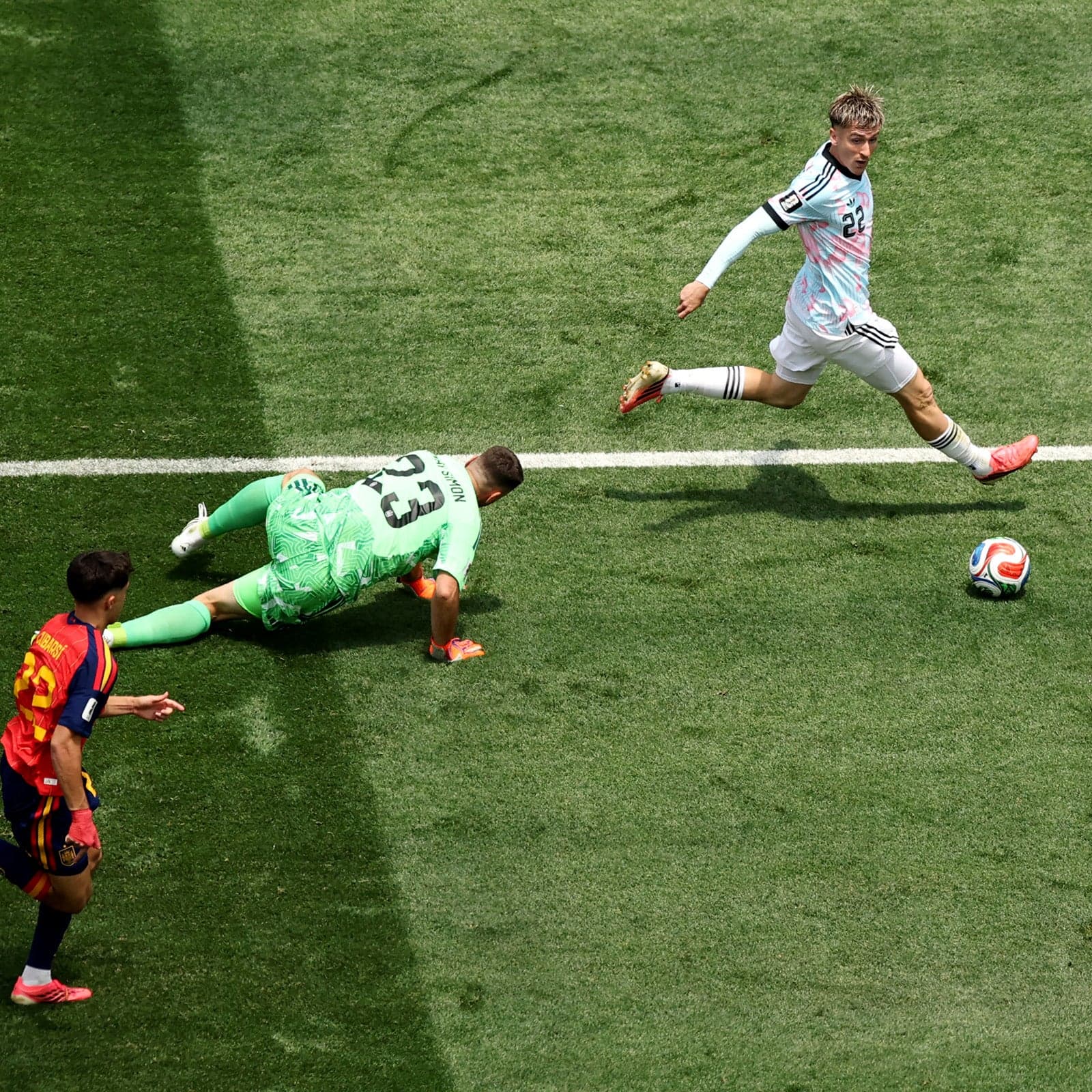 BELGIUM KNOCKED OUT AFTER SPAIN'S LATE WINNER